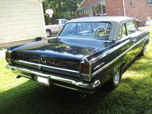 Single to dual outlet exhaust system from a 1963 Oldsmobile Jetfire (factory turbocharged model) was used with aftermarket chrome tips.