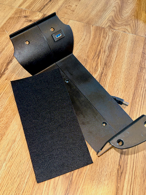 I cut a piece of stiff felt for the bottom to cover the screw heads.