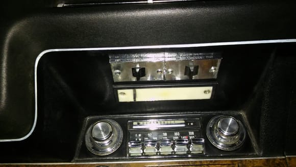Maybe this picture will help a bit. My '69 4-4-2 convertible has both the power top (standard equipment) and the optional power antenna.  The power top switch mounts to the left, regardless of if you have another power option switch.  Randy C.