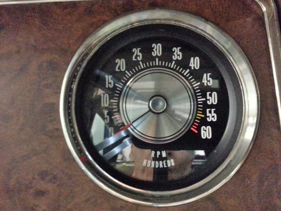 Custom tachometer made from clock by local instrument shop