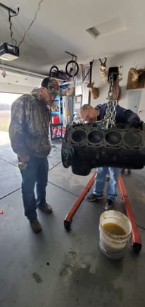 My Dad and little brother acting like they know something about engines.