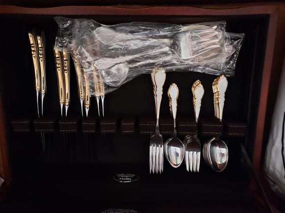 Grandma Nixon's fine silverware, story has it that Grandpa bought her one piece every year for their anniversary until she had a complete 8 place settings and serving utensils 
