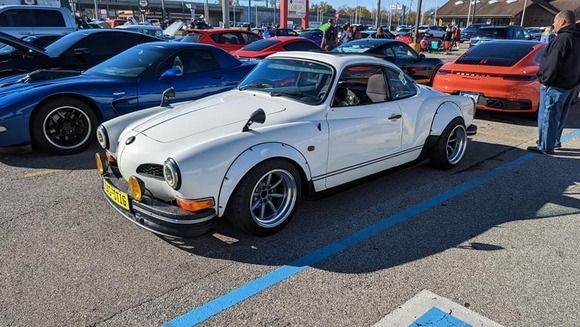 Who would do this to a pretty little Karman Ghia and why..
Nice pics, thanks. I wish there was a car show regularly here.