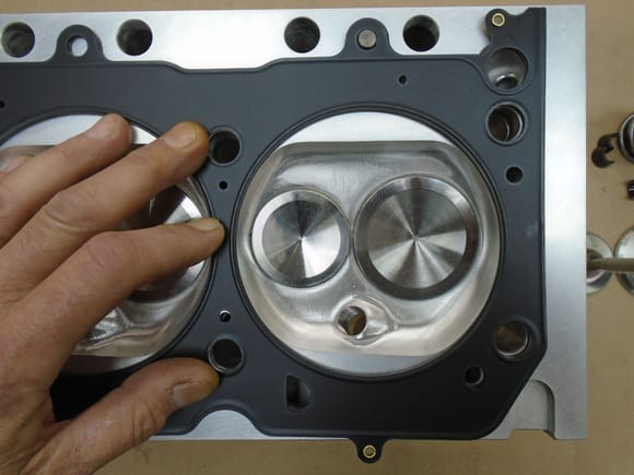 4.200" ID MLS head gasket overhanging into the right and left side of the combustion chambers