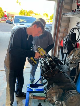 My son and father disassembling the 400. 