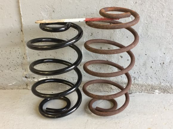 The new catalog spring was a full coil too shot.  The Rusty spring is the factory original rear spring.