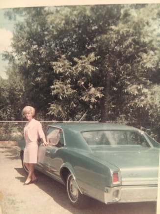 My mother in 1967 with her new car.