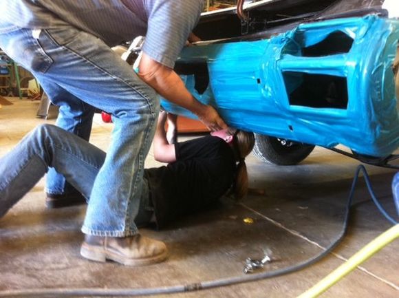 Terry test fitting the rear bumper-that's blue protective tape not paint