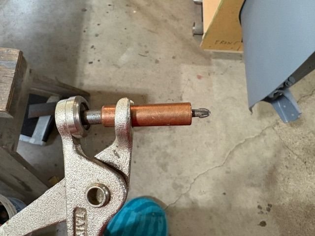 A Cleco in the retracted position.  It will hold parts together like this
