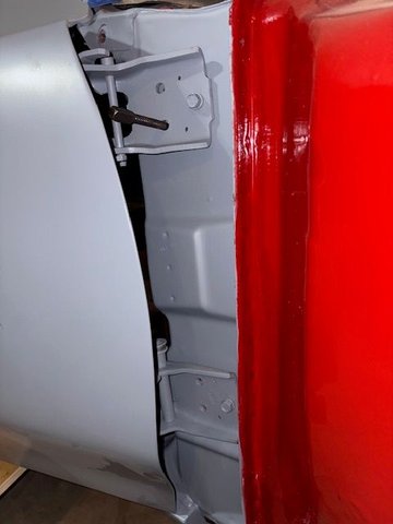 The door support fixture makes cap screw attachment so easy.  I cannot imagine doing without it.  Just jack it up until things line up and bolt together.  Doo try to get the car body hinge leaf in the “center” of the adjustment range.  I started by just tightening the single center top screw
