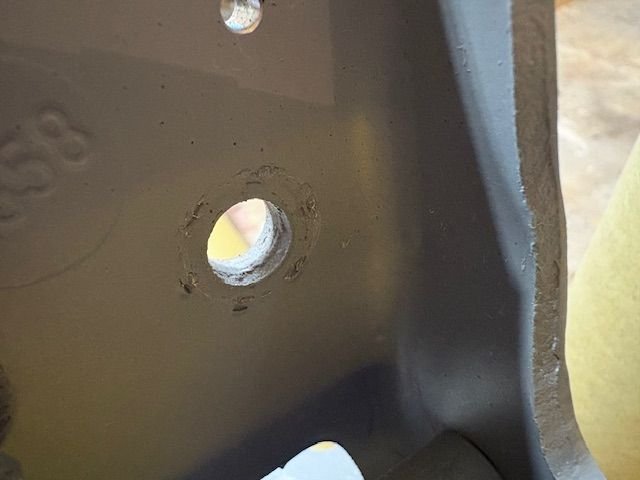 Purpose is obviously to lock these cap screws down and prevent loosening.  So I don?t want to load up this area with paint, or the lock down won?t happen.