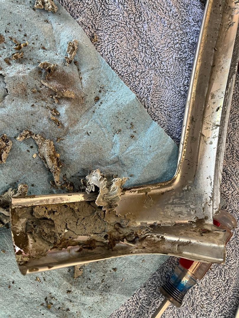What is this stuff behind the trip pieces and should I replace it and if so with what?
