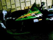 new green plastic skiis