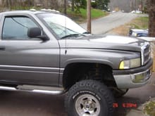 Dodge 1999 005. I like the lights on the top and the Mags. Don't have to go buy them now. Did order my new tires 315-75-16