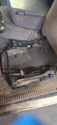 This is what makes the extra cab seats easy: the lower cushion simply unbolts and can be lifted out