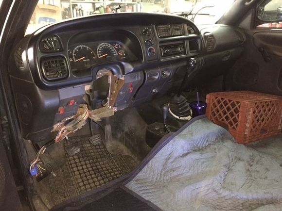 Pulling the steering column is so much easier once you've taken the seats out. (New seats going back in).