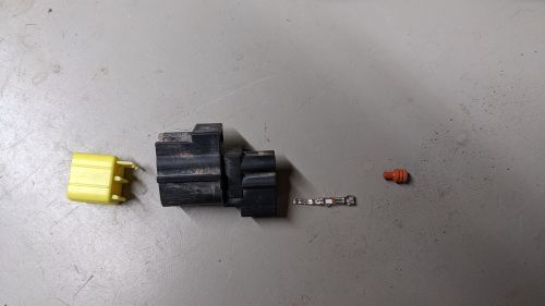 The little orange bushing on the right is rubber