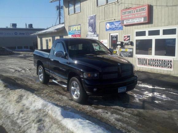 blackram sitting in front of the shop