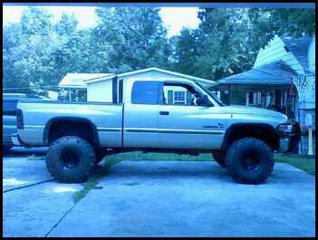 1999 Dodge Ram 1500 with 5&quot; susp  3&quot; body and 38.5 TSLs