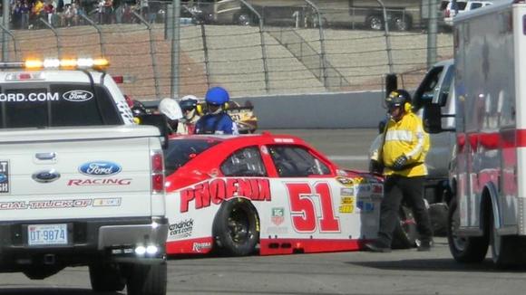 Busch slams the wall on the backstrech at the Kobalt 400