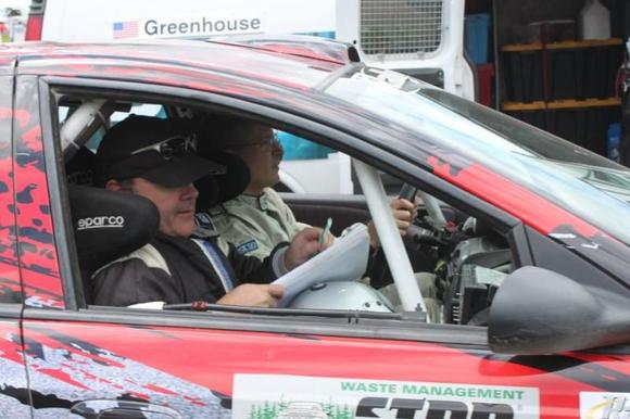 Chris Greenhouse and co-driver Brian Johnson pull into the service parc at STPR 2012, Wellsboro PA USA