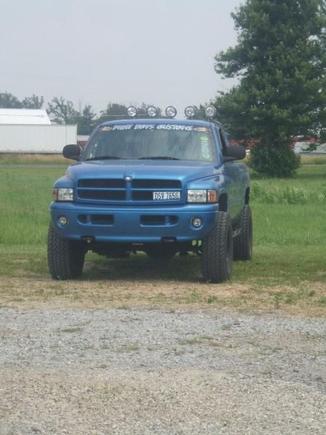 Bad pic but homemade roll bar and 5 procomp lights...3rd set of tires same wheels  Procomp At