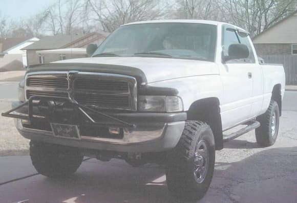 Truck pic March 11 2009. Pre runner bar installed and lights wired. I think this is not the trucks best angle.