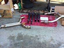 Leftover mid pipe on the left donated it's bends.   Gave me the flexibility (haha pun intended) to put the tips at whatever I need.