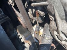 I am trying to replace my VVT solenoid on my driver side but those two hoses Are in the way. Is there any way to remove the solenoid without removing those hoses or if not if I do remove the hoses will and fluid  spill out
