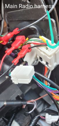 Taps from aswc1 red wire to red wire (connected main radio harness) and aswc1 black to black (main radio harness)