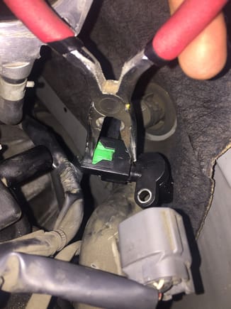 Grab some needle nose pliers and place it on the sensor like this. 