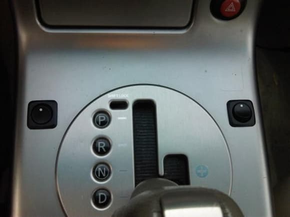 LEFT BUTTON CONTROLS THE DVD BYPASS FOR PIONEER WATCH WHILE U DRIVE AND THE RIGHT IS FOR TEH 2 12&quot; KENWOOD SUBS