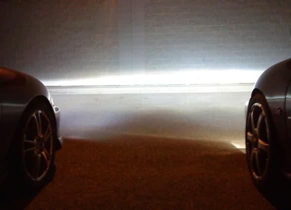 My buddy's car (left) and my car (right), both with projectors