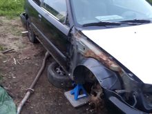 Picture of the parts car I took a while ago. Since this picture, I've put the rear end on jack stands and started dismantling the rear suspension