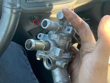 Pointer finger pointing at idea, idea for where to mount temp gauge for aem gauge.... *goes and buys 1/8th npt drill bit and tap*