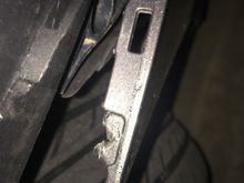 Where the plastic screw snaps in it appears the groove is torn that hold it.  Now it pops open.  This occurred after I replaced a headlight bulb.  It seemed to be fin but several month later it came loose.  