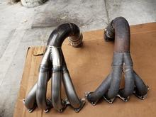 My header design version the modified kamikaze header.  2" primaries vs 1 7/8"