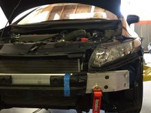 Crash beam foam trimmed to make room for tow point. Total point fastened with Grade a bolts and Nylock fastener.