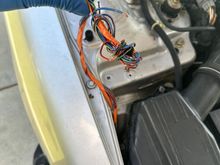 cut up harness on the car, any idea why its orange?