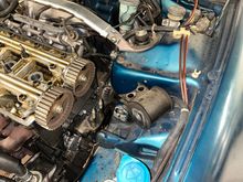 Engine supported from below, motor mount off to remove the old timing belt