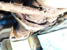 The not so old flange on the Bosal catalytic convertor disintegrating.