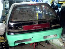Trying on the rear bumper.