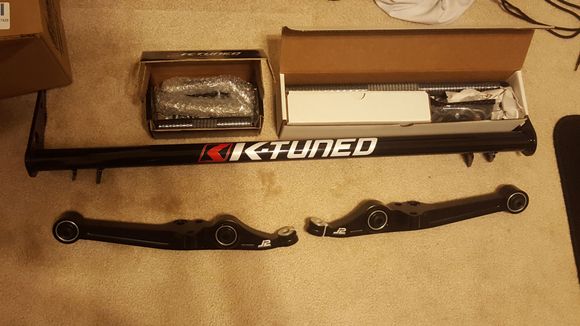 Got a couple new parts, j2 engineering lower control arms with spherical ball bushings and k-tuned traction bar. I'm going to change some things with thw traction bar later because they have a design flaw on how they mount to the lower control arms.