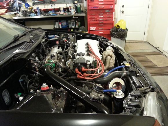Well its finally ready for a road test, got a mishimoto slim fan, was a tight fit. Had a issue with turbo oil feed line leaking, but fixed that. And i couldnt get my car to idle or run worth shit, scratching my head for a long time with the apexi safc. I had a check engine light for o2 heater circuit, so decided to resolve that first. Ended up my o2 was ok and circuits checked out. My ecu had failed and was the problem. Pulled the ecu from my DC 4 door daily and vehicle idles fine and runs.