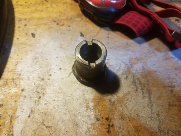 and here's the OEM hub after cutting it off the wheel. I'm not sure why but I didn't get a pic of it after I welded it into position on the Lude wheel, but you can take my word for it, it came out lovely and the teeth lined up perfectly with the steering shaft.