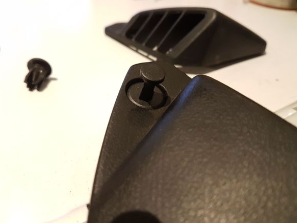 Open the pin with a small flat blade screw driver