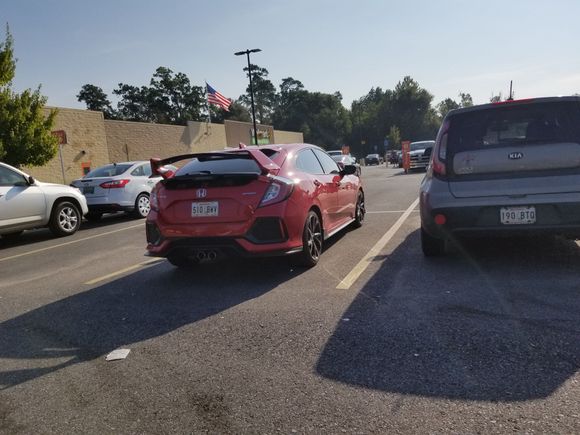 I saw this from a distance this morning and thought it was a type R but when I drove around to it it was a sport. Other than the silly writing on it i thought it looked sharp. 