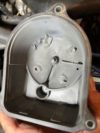 I don’t know what happen here, but I took off distributor cap to replace and this was what it looked like when I took it off the rotor was broken in pieces too.