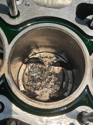 Cylinder 2 piston all fudged up and scratched cylinder wall