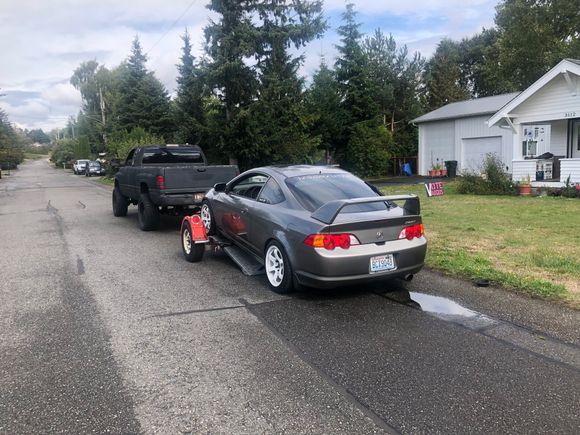 Buy this RSX-S! Blown engine. I had to drive like, ohhh.. about 18 hours all together to get it. Was 2000 with price of car and everything else. I bought an 07 civic si engine for 1200 and installed it. 